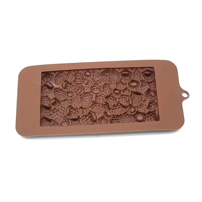 A rectangular silicone mold with a honeycomb pattern, shown on a plain white background.